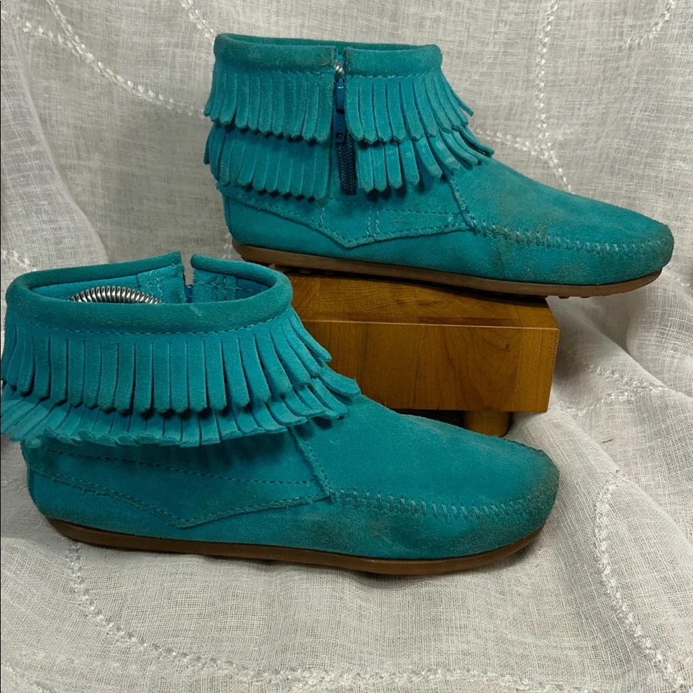 Minnetonka leather fringe moccasins with side zipper